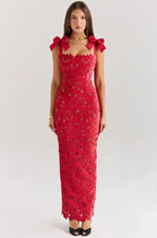 Robe longue sans manches en dentelle avec nœuds, confectionnée en tissu léger et délicat, parfaite pour les journées…