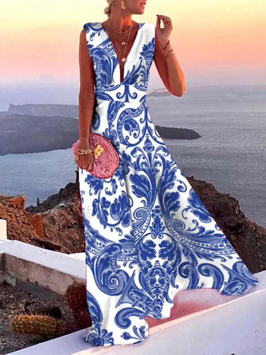 Robe longue sans manches en tissu fluide, col en V, parfaite pour l'été et les journées à la plage.