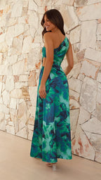 Robe longue verte à une épaule, en tissu léger, avec fente latérale et imprimé floral coloré pour un look élégant.