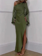 Robe longue verte à épaule dénudée, en tissu fluide, avec fente sur le côté, parfaite pour les soirées élégantes.