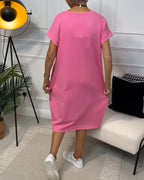 Robe midi ample en tissu fluide, manches courtes, style décontracté avec poches pratiques, idéale pour toutes les…