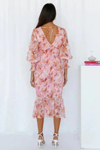 Robe midi femme fluide à fleurs, manches longues, col V, ourlet évasé, idéale pour un look chic et décontracté.