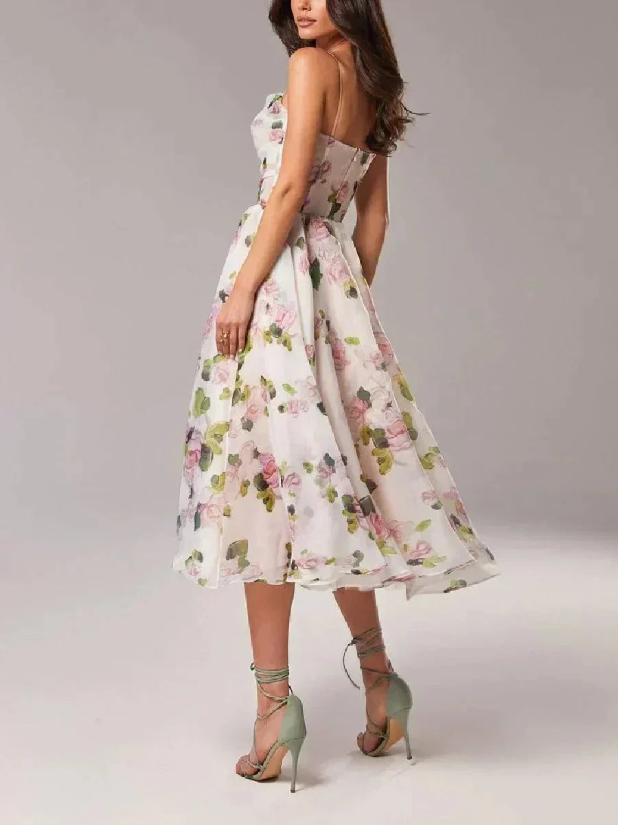 Robe midi sans manches en tissu léger, col droit, imprimé floral, idéale pour les événements printaniers et estivaux.