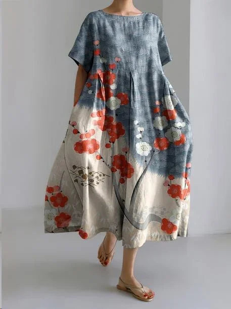 Robe midi à imprimé floral, en coton léger, coupe ample avec manches courtes, idéale pour le printemps.