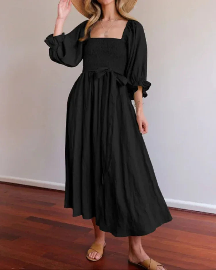 Robe midi portefeuille à manches longues, col V, en tissu fluide pour un confort et un style décontracté.