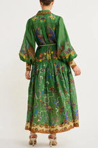 Robe midi verte à imprimé oiseaux, manches longues, col chemise, ceinture intégrée, parfaite pour l'automne.
