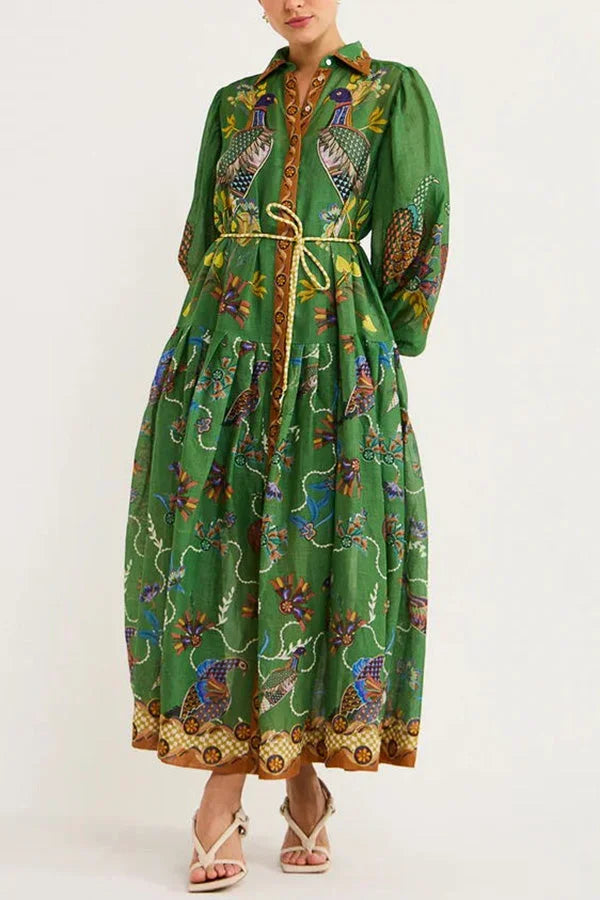 Robe midi verte en tissu léger avec imprimé oiseaux, manches longues, col chemise et ceinture assortie, idéale pour…