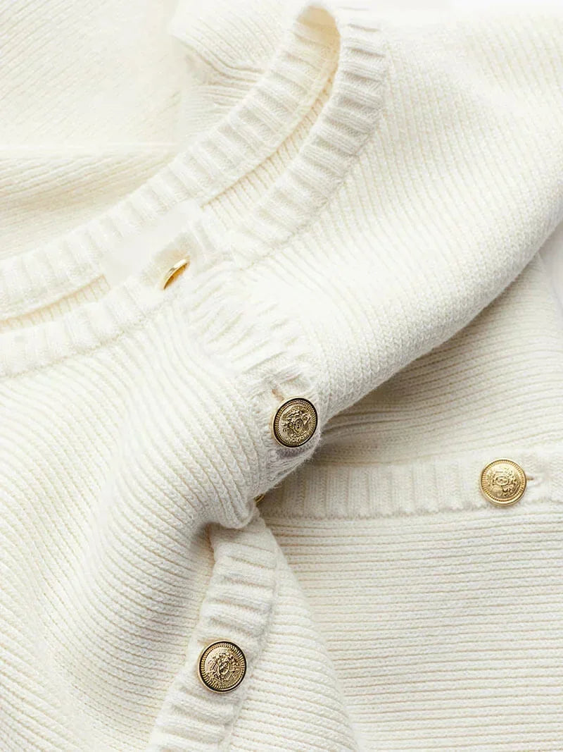 Robe courte côtelée à manches courtes avec boutons, en coton léger, parfaite pour les journées d'été. Plusieurs coloris…