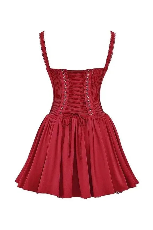 Robe courte évasée en coton léger, décolleté froncé, bretelles multiples, parfaite pour les soirées d'été.