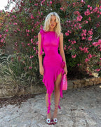 Robe courte violette sans manches avec volants et motifs floraux en coton, idéale pour les soirées d'été.