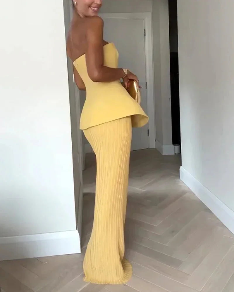 Top bustier jaune à basque avec jupe côtelée, en coton doux, design ajusté et élégant pour un look féminin.