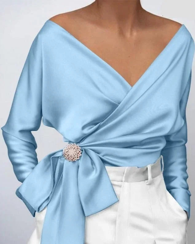 Top femme portefeuille rose avec nœud et broche, en simili cuir.