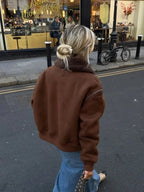 Veste aviateur marron femme en simili cuir avec col en fausse fourrure pour un style décontracté.