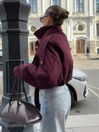 Veste bomber bordeaux femme, col montant, avec poches, en tissu résistant et facile d'entretien.