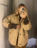 Veste de mi-saison femme en velours côtelé bleu foncé, col classique et coupe décontractée.