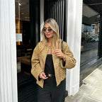 Veste femme à paillettes, coupe élégante, idéale pour les soirées et événements spéciaux.