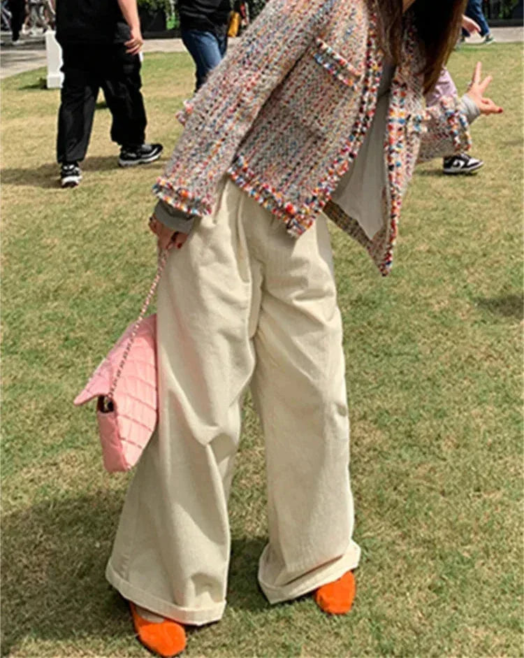 Multicolore Tweed-Jacke für Frauen mit fransigen Kanten und lässigem Design, ideal für verschiedene Anlässe.